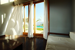 The Wind house living room is a great place to kick back and enjoy a beer after a day playing on the sea